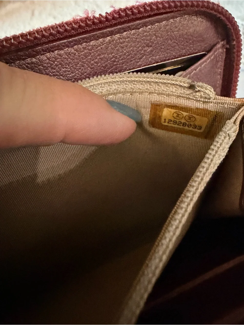 CHANEL Plum Camellia Zip Around Leather Wallet